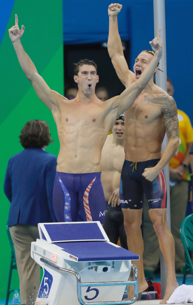 Michael Phelps celebrating with Caeleb Dressel 