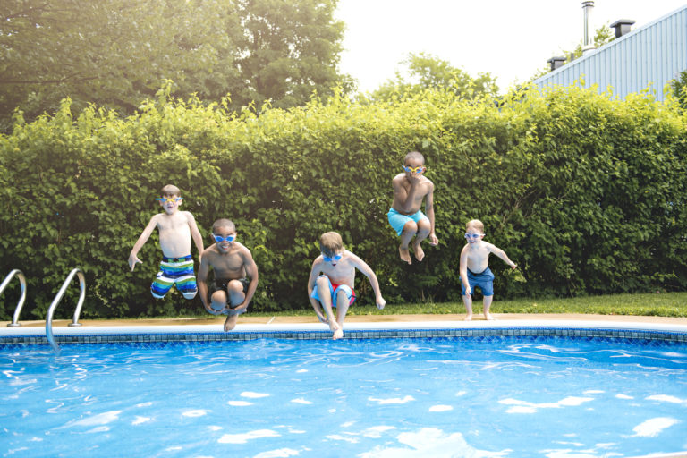 Goup of Childrens in outside swimming pool