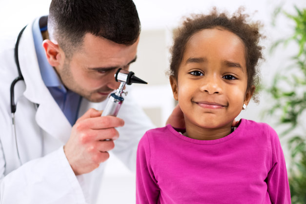 Doctor Checking Child's Ear