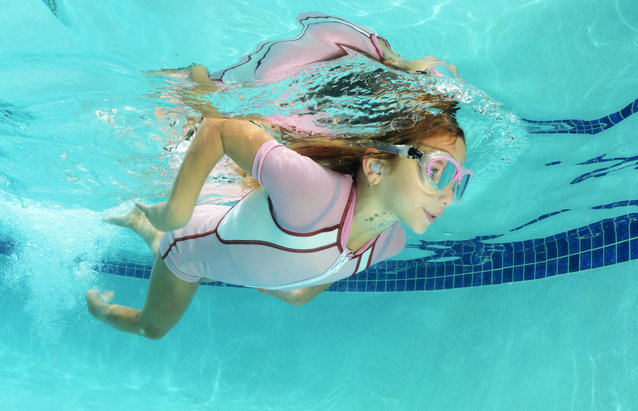 Girl Swimming Under Water 