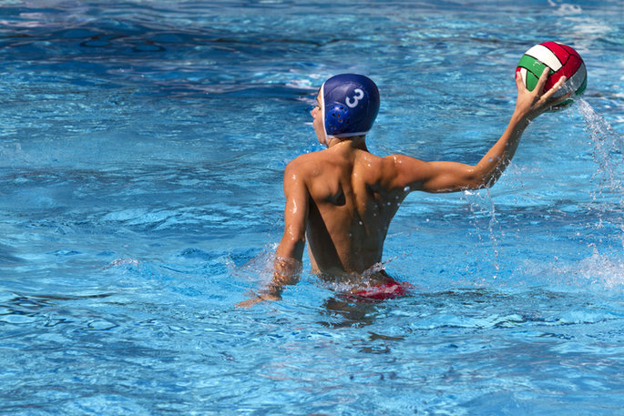 water polo player treading water