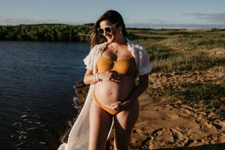 pregnant woman by water