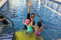 SwimJim swim instructor in swimming pool with students